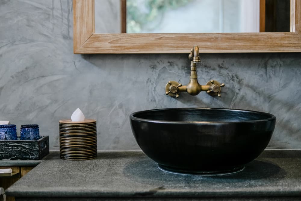 black-sink-vintage-copper-faucet-loft-bathroom-2023-11-27-04-49-14-utc 1 (1).jpg